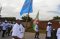 The EASF Head of Peace Operations' Department carries the EASF flag