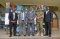 The EASF Director (2nd left), Exercise Director (3rd left) Force Commander (4th left) and two participants during the AAR 