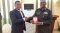 The Deputy Joint Chief of Staff of the Sudanese Armed Forces Lt. Gen. Abdallah presents a gift to EASF Director.