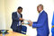EASF Director Brig Gen Getachew Shiferaw Fayisa (left) and UNITAR's Director of Division for Peace, Mr. Evariste Karambizi exchange the signed documents during the meeting on 10th March 2022. 