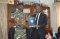 The Director presents the Chief of the Defence Forces with the EASF Fact-book.
