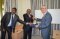 H.E Ambassador Erik Lundberg (right) receives a gift from the EASF Director Dr. Bouh (center) accompanied by the Head of Peace Operations' Department, Brig. Albert Kendagor (left). 