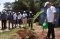 The outgoing Head of Civilian Component, Mr. Steve Lalande waters his commemoration tree during his farewell ceremony.