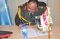 The outgoing Force Commander Maj. Gen. Aladdin Osman Mirghani from the Republic of the Sudan pens the handover documents after completion of tour of duty at the Force Headquarters in Addis Ababa, Ethiopia on 23rd July 2020.